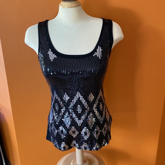 3/$20. Three tank tops sizes extra small, small and medium. - Picture 2 of 13